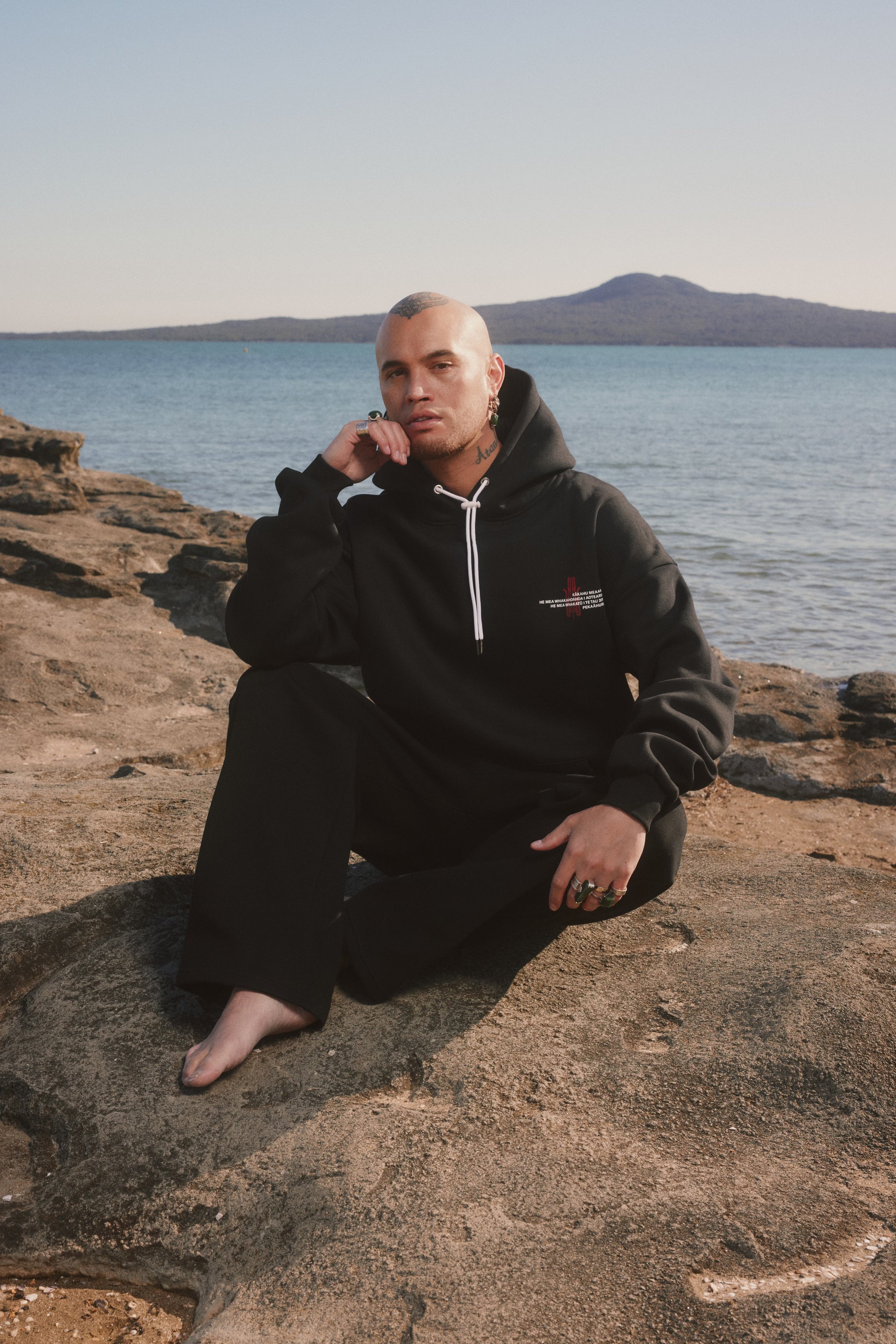 product image  TE REO COSYSZN HOODIE | BLACK